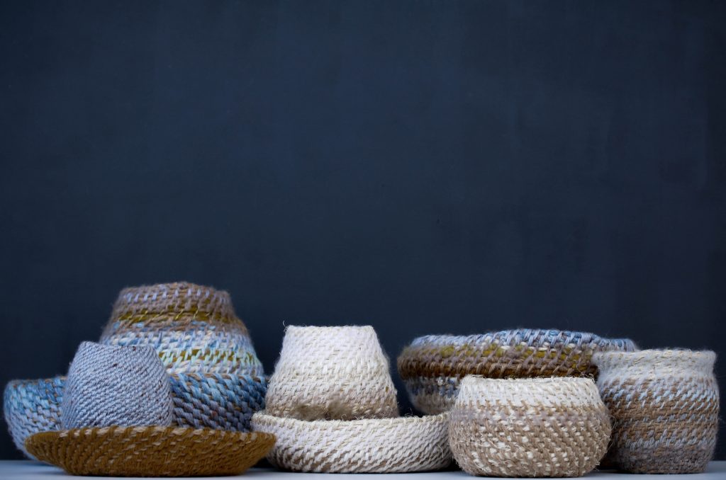 Photo of a group of small, woven baskets