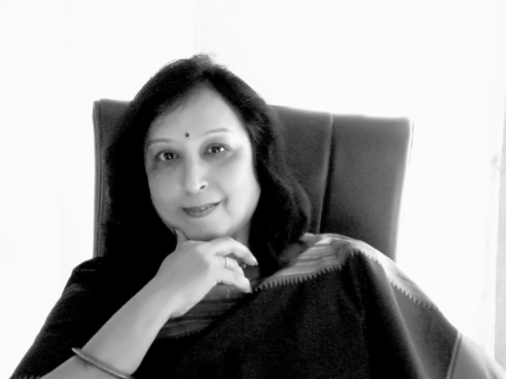 Black and white portrait of Menka Shivdasani