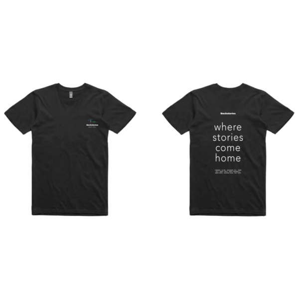 A photogtaph of a t-shirt. On the front is a small white Backstories logo. Above it is a cute illustration of a sprinkler. On the back in big letters across the entire back of the shirt is the slogan 'where stories come home' in sans-serif.